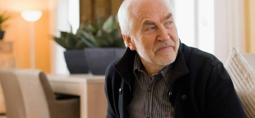 old man sitting in chair